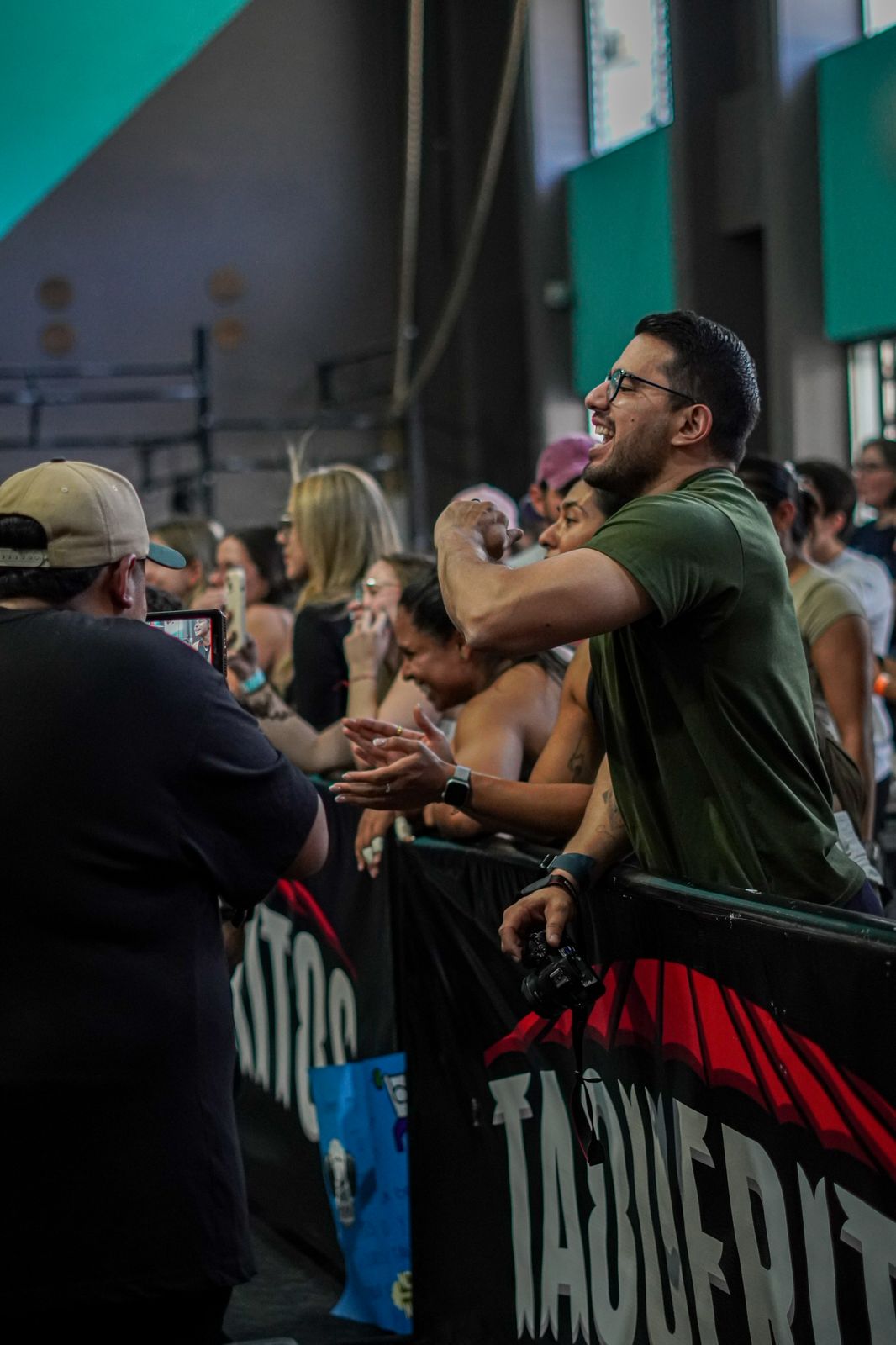 Audience cheering their favorite athletes